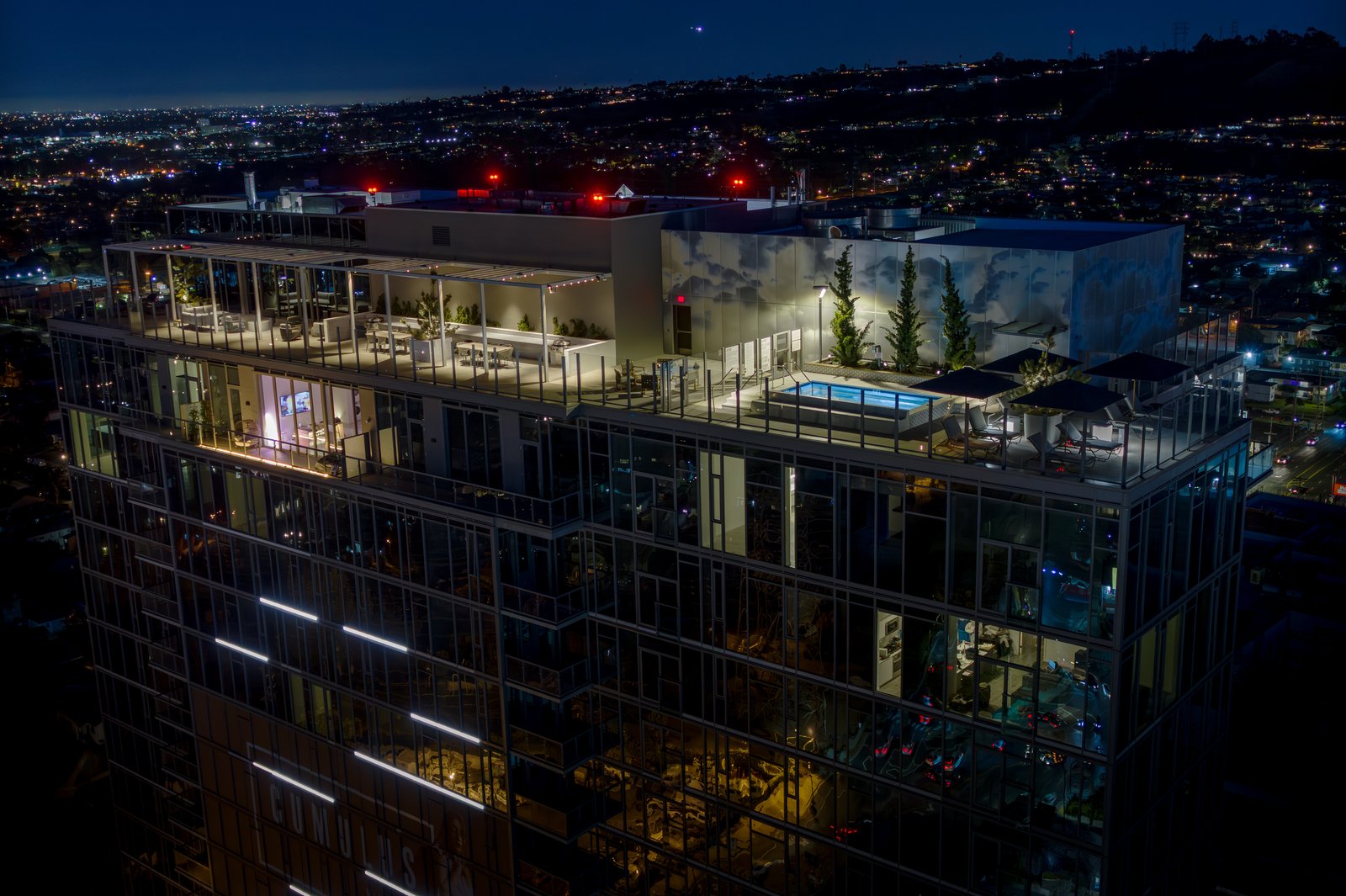 Cumulus rooftop drone night aerial wide